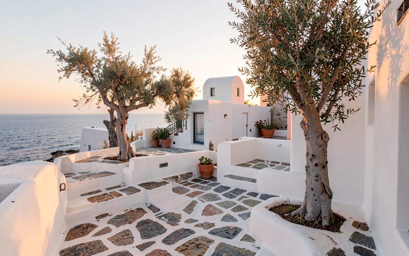 A whitewashed terrace above the sea in the Cyclades
