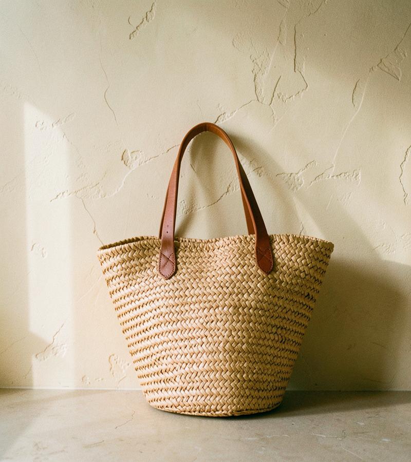 A woven straw tote bag